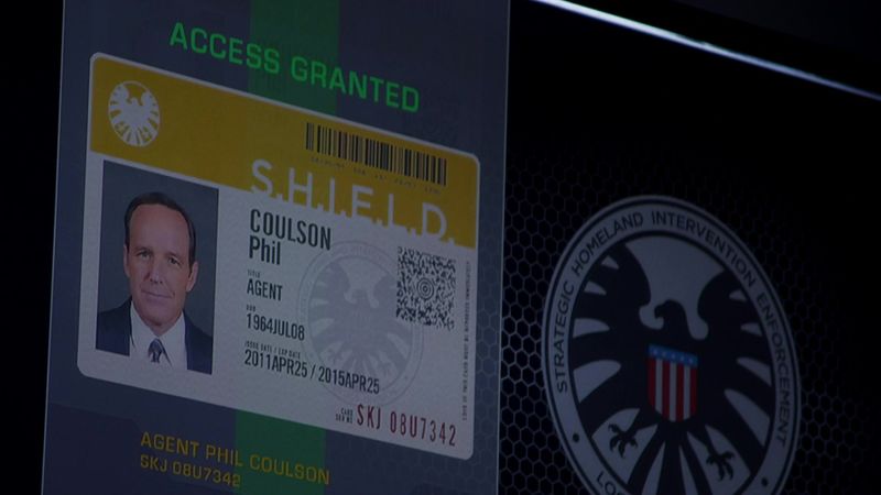 File:Phil Coulson's S.H.I.E.L.D. badge in Pilot.jpg